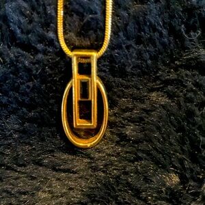 Lia Sophia gold chain necklace with geometric gold and onyx pendant